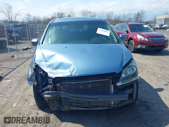 2007 Honda Odyssey EX-L with VIN 5FNRL38727B092077, listed as a IAAI auction lot 41972810 with 211,770 mi miles and . Bid and sale history available at DreamBid. Image 13.