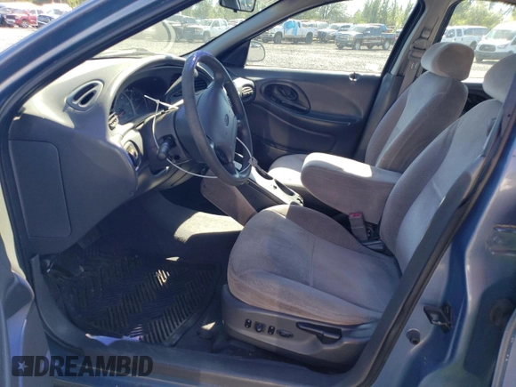 1999 Ford Taurus SE Standard with VIN 1FAFP58U9XG271897, listed as a Copart auction lot 73048784 with 190,518 mi miles and Salvage title. Bid and sale history available at DreamBid. Image 7.