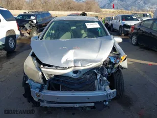 2012 Toyota Yaris L with VIN JTDKTUD36CD511401, listed as a IAAI auction lot 41321430 with 150,896 mi miles. Bid and sale history available at carsss.com. Image 12.
