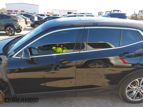 2019 BMW X2 sDrive28i with VIN WBXYJ3C50KEP77327, listed as a IAAI auction lot 40922194 with 94,672 mi miles. Bid and sale history available at carsss.com. Image 18.