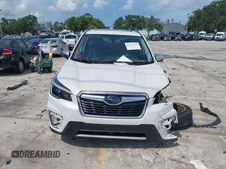 2021 Subaru Forester Touring with VIN JF2SKAXC8MH574427, listed as a IAAI auction lot 42529701 with 11,409 mi miles and . Bid and sale history available at DreamBid. Image 13.