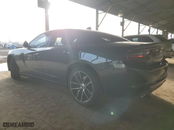 2016 Dodge Charger SXT with VIN 2C3CDXHG9GH280782, listed as a Copart auction lot 41450875 with 124,904 mi miles and Salvage Title. Bid and sale history available at carsss.com. Image 2.