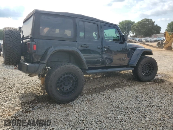 2019 Jeep Wrangler Unlimited Rubicon with VIN 1C4HJXFN2KW525606, listed as a Copart auction lot 62674225 with 55,128 mi miles and Salvage title. Bid and sale history available at DreamBid. Image 3.