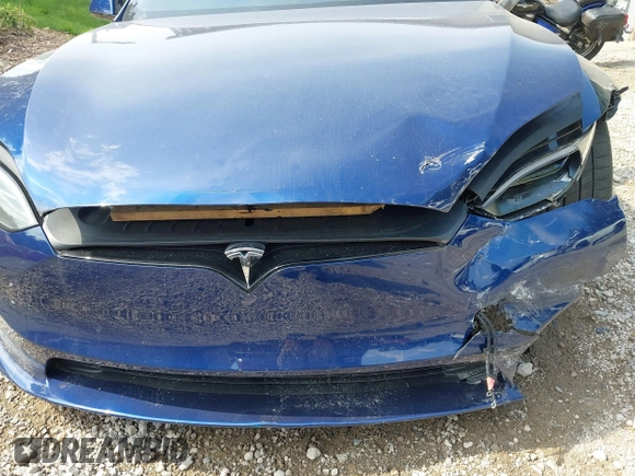 2022 Tesla Model S with VIN 5YJSA1E55NF486443, listed as a IAAI auction lot 42720110 with Not provided miles and . Bid and sale history available at DreamBid. Image 24.