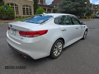 2016 Kia Optima EX with VIN 5XXGU4L33GG080449, listed as a Copart auction lot 61627205 with 154,294 mi miles and Clean title. Bid and sale history available at DreamBid. Image 4.