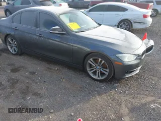 2015 BMW 3 Series 328i with VIN WBA3A5G55FNS87532, listed as a IAAI auction lot 41580190 with 154,901 mi miles. Bid and sale history available at carsss.com. Image 1.