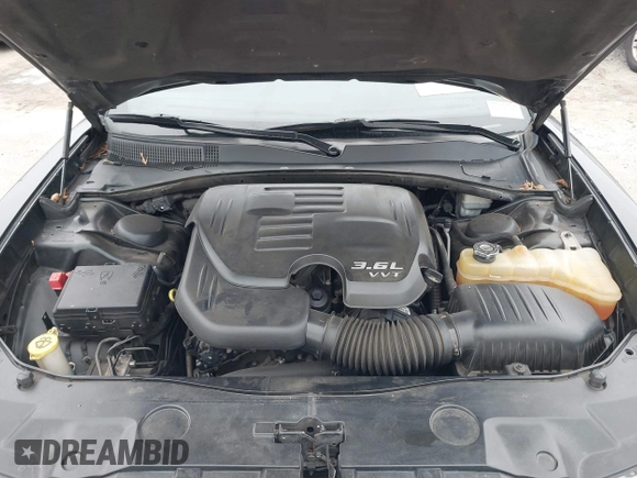 2013 Dodge Charger SXT with VIN 2C3CDXHG2DH525370, listed as a IAAI auction lot 41395980 with 226,079 mi miles. Bid and sale history available at carsss.com. Image 10.