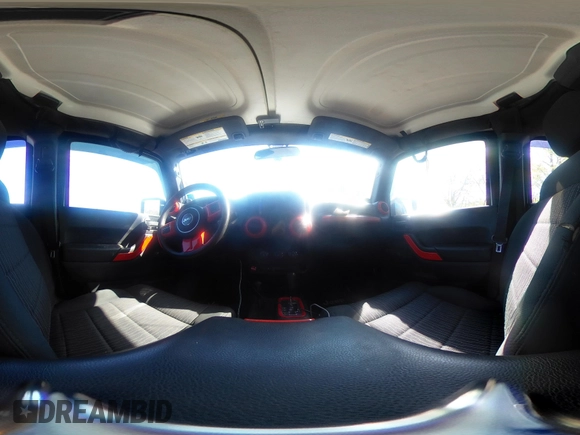 2012 Jeep Wrangler Unlimited Sport z VIN 1C4BJWDG1CL220511, wystawiony jako IAAI lot #42227037 z przebiegiem 157 914 mil mil oraz . Historia ofert i sprzedaży dostępna na DreamBid. Obrazek 18.