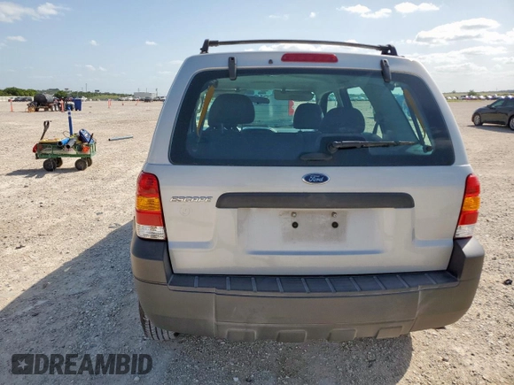 2007 Ford Escape XLS with VIN 1FMYU02Z87KB60530, listed as a Copart auction lot 61273345 with 57,574 mi miles and Salvage title. Bid and sale history available at DreamBid. Image 6.