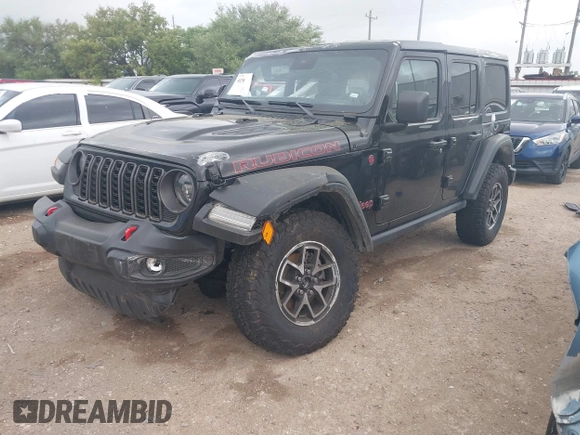 2024 Jeep Wrangler Rubicon with VIN 1C4PJXFG6RW337596, listed as a IAAI auction lot 41958788 with 15,942 mi miles and . Bid and sale history available at DreamBid. Image 2.