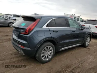 2020 Cadillac XT4 FWD Premium Luxury z VIN 1GYFZCR43LF050118, wystawiony jako Copart lot #49529635 z przebiegiem 93 290 mil mil oraz Tytuł czysty. Historia ofert i sprzedaży dostępna na DreamBid. Obrazek 3.