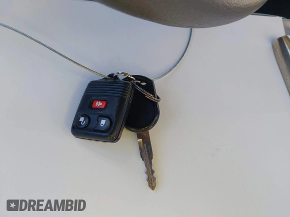 2004 Ford Freestar SE z VIN 2FMZA51614BB12374, wystawiony jako IAAI lot #40813075 z przebiegiem Nie podano mil oraz . Historia ofert i sprzedaży dostępna na DreamBid. Obrazek 11.
