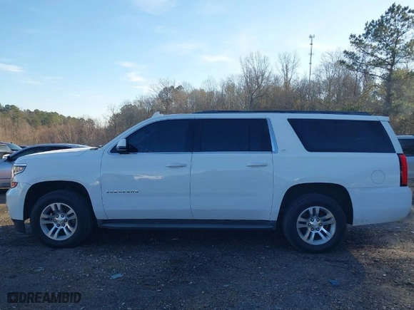 2015 Chevrolet Suburban LT with VIN 1GNSCJKC2FR607249, listed as a IAAI auction lot 41258843 with NaN miles. Bid and sale history available at carsss.com. Image 14.