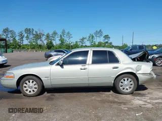 2004 Mercury Grand Marquis LS Premium z VIN 2MEHM75W64X681851, wystawiony jako IAAI lot #42389437 z przebiegiem 118 153 mil mil oraz . Historia ofert i sprzedaży dostępna na DreamBid. Obrazek 14.