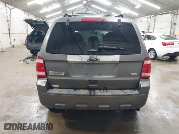 2010 Ford Escape Limited z VIN 1FMCU9EG2AKC17658, wystawiony jako IAAI lot #42430110 z przebiegiem 143 964 mil mil oraz . Historia ofert i sprzedaży dostępna na DreamBid. Obrazek 16.