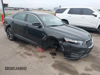 2015 Ford Taurus SHO z VIN 1FAHP2KTXFG175198, wystawiony jako IAAI lot #42288634 z przebiegiem 76 833 mil mil oraz . Historia ofert i sprzedaży dostępna na DreamBid. Obrazek 1.