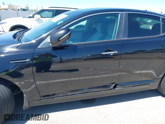 2015 Kia Optima LX z VIN 5XXGM4A76FG507580, wystawiony jako IAAI lot #42544939 z przebiegiem 99 804 mil mil oraz . Historia ofert i sprzedaży dostępna na DreamBid. Obrazek 6.