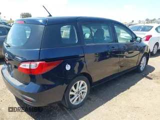 2015 Mazda 5 Sport with VIN JM1CW2BL0F0183911, listed as a IAAI auction lot 42116880 with 154,299 mi miles. Bid and sale history available at carsss.com. Image 4.