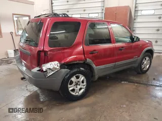 2001 Ford Escape XLT with VIN 1FMYU04101KF46809, listed as a IAAI auction lot 41664202 with 256,468 mi miles. Bid and sale history available at carsss.com. Image 4.