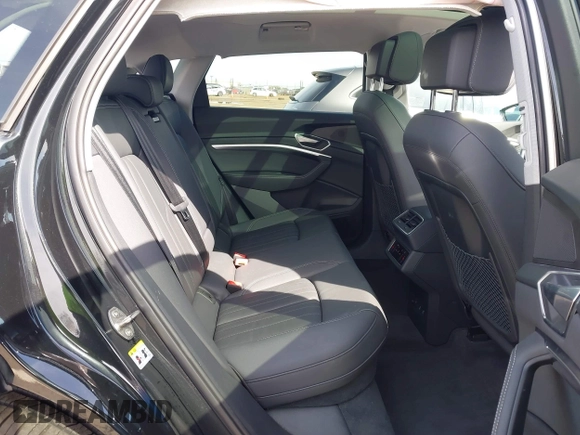 2022 Audi e-tron Premium with VIN WA1AAAGE6NB027461, listed as a IAAI auction lot 41830461 with 25,727 mi miles. Bid and sale history available at carsss.com. Image 8.