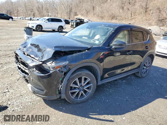 2017 Mazda CX-5 Grand Touring with VIN JM3KFBDL6H0211374, listed as a Copart auction lot 49079775 with 142,164 mi miles and Salvage Title. Bid and sale history available at carsss.com. Image 1.
