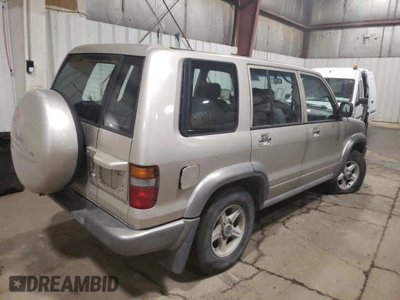 1999 Isuzu Trooper S z VIN JACDJ58X8X7915370, wystawiony jako Copart lot #83466824 z przebiegiem 143 588 mil mil oraz Czysty tytuł • Clean title. Historia ofert i sprzedaży dostępna na DreamBid. Obrazek 3.
