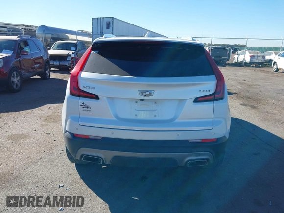 2020 Cadillac XT4 AWD Premium Luxury z VIN 1GYFZDR46LF083118, wystawiony jako IAAI lot #40495567 z przebiegiem 83 224 mil mil oraz . Historia ofert i sprzedaży dostępna na DreamBid. Obrazek 16.