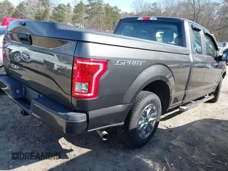 2015 Ford F-150 XL with VIN 1FTEX1CP7FFD00690, listed as a IAAI auction lot 41672251 with 69,752 mi miles. Bid and sale history available at carsss.com. Image 4.