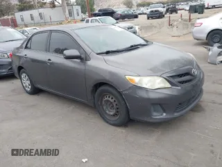 2011 Toyota Corolla L with VIN JTDBU4EE7BJ106810, listed as a IAAI auction lot 42054750 with 256,064 mi miles. Bid and sale history available at carsss.com. Image 1.