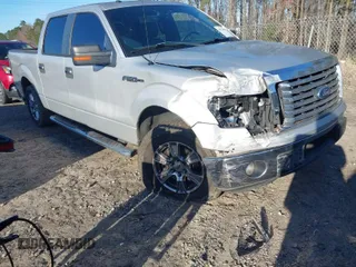 2012 Ford F-150 XL with VIN 1FTFW1CF7CKD28801, listed as a IAAI auction lot 41736499 with 166,001 mi miles. Bid and sale history available at carsss.com. Image 1.
