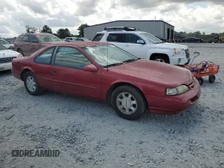 1995 Ford Thunderbird LX with VIN 1FALP6245SH140633, listed as a Copart auction lot 54914685 with 65,451 mi miles and Clean Title. Bid and sale history available at DreamBid. Image 4.