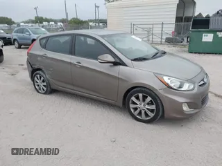 2013 Hyundai Accent SE with VIN KMHCU5AE5DU098655, listed as a IAAI auction lot 41738745 with 107,976 mi miles. Bid and sale history available at carsss.com. Image 1.