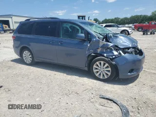 2015 Toyota Sienna LE with VIN 5TDJK3DC4FS107711, listed as a Copart auction lot 57693005 with 141,370 mi miles and Salvage title. Bid and sale history available at DreamBid. Image 4.