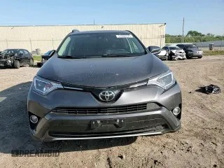 2018 Toyota RAV4 XLE with VIN 2T3WFREV0JW517488, listed as a Copart auction lot 51000975 with 68,105 mi miles and Salvage title. Bid and sale history available at DreamBid. Image 11.