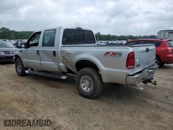 2004 Ford F-250 XL with VIN 1FTNW21L94EE03900, listed as a Copart auction lot 57838765 with 185,837 mi miles and Salvage title. Bid and sale history available at DreamBid. Image 2.