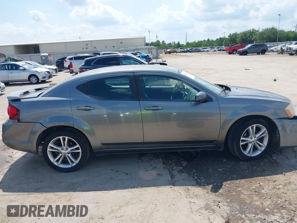 2012 Dodge Avenger SXT with VIN 1C3CDZCB9CN212328, listed as a IAAI auction lot 42360745 with 189,311 mi miles and . Bid and sale history available at DreamBid. Image 13.