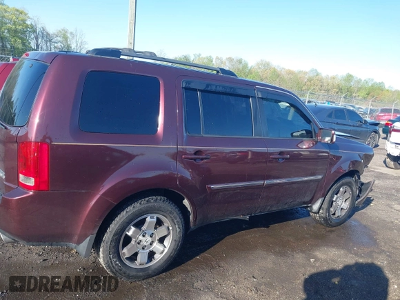 2011 Honda Pilot Touring z VIN 5FNYF4H9XBB040893, wystawiony jako IAAI lot #41933530 z przebiegiem 161 725 mil mil oraz . Historia ofert i sprzedaży dostępna na DreamBid. Obrazek 12.