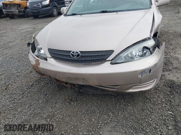 2002 Toyota Camry LE z VIN 4T1BE32K72U028489, wystawiony jako IAAI lot #41760604 z przebiegiem 163 950 mil mil oraz . Historia ofert i sprzedaży dostępna na DreamBid. Obrazek 6.