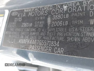 2016 Kia Forte LX with VIN KNAFK4A67G5571834, listed as a IAAI auction lot 41706701 with 100,621 mi miles. Bid and sale history available at carsss.com. Image 9.