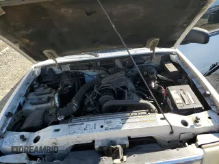 1999 Ford Ranger XL z VIN 1FTYR14C0XPA08314, wystawiony jako Copart lot #78036824 z przebiegiem 341 005 mil mil oraz Szkoda całkowita • Salvage title. Historia ofert i sprzedaży dostępna na DreamBid. Obrazek 11.