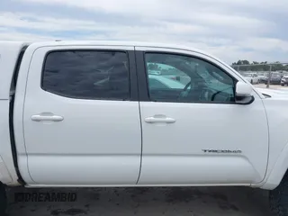 2017 Toyota Tacoma SR5 z VIN 5TFCZ5ANXHX065886, wystawiony jako IAAI lot #42308228 z przebiegiem 294 931 mil mil oraz . Historia ofert i sprzedaży dostępna na DreamBid. Obrazek 13.