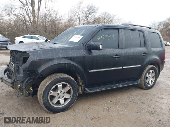 2011 Honda Pilot Touring with VIN 5FNYF4H94BB089930, listed as a IAAI auction lot 41477596 with 171,831 mi miles. Bid and sale history available at carsss.com. Image 15.