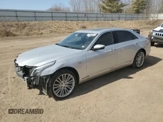 2018 Cadillac CT6 Luxury AWD z VIN 1G6KE5R62JU113203, wystawiony jako Copart lot #49598555 z przebiegiem 103 082 mil mil oraz Szkoda całkowita • Salvage title. Historia ofert i sprzedaży dostępna na DreamBid. Obrazek 1.
