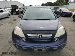 2009 Honda CR-V EX-L with VIN 5J6RE387X9L011573, listed as a Copart auction lot 53326015 with 141,115 mi miles and Clean Title. Bid and sale history available at carsss.com. Image 5.