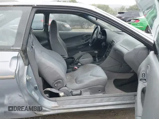 1995 Ford Probe z VIN 1ZVLT20A6S5154983, wystawiony jako IAAI lot #42301574 z przebiegiem 128 515 mil mil oraz . Historia ofert i sprzedaży dostępna na DreamBid. Obrazek 5.