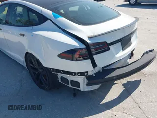 2022 Tesla Model S Plaid with VIN 5YJSA1E64NF484904, listed as a IAAI auction lot 41594464 with 25,299 mi miles and . Bid and sale history available at DreamBid. Image 19.