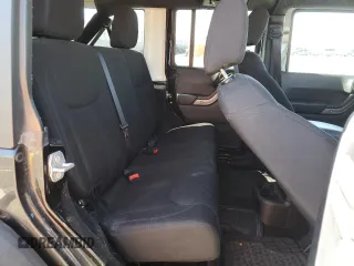 2014 Jeep Wrangler Unlimited Sport with VIN 1C4BJWDG8EL207287, listed as a Copart auction lot 49522335 with 67,472 mi miles and Salvage Title. Bid and sale history available at carsss.com. Image 11.