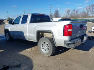 2014 GMC Sierra 1500 SLE with VIN 1GTV2UEH8EZ115048, listed as a IAAI auction lot 41813465 with 75,739 mi miles. Bid and sale history available at carsss.com. Image 3.