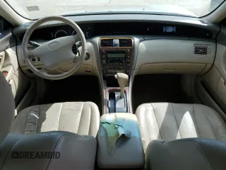 2000 Toyota Avalon XL z VIN 4T1BF28B7YU074685, wystawiony jako Copart lot #54523145 z przebiegiem 172 258 mil mil oraz Szkoda całkowita • Salvage title. Historia ofert i sprzedaży dostępna na DreamBid. Obrazek 8.