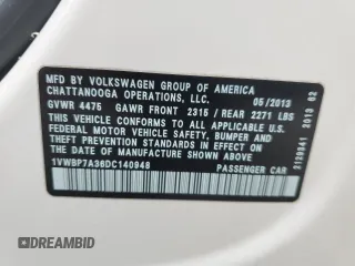 2013 Volkswagen Passat SE z VIN 1VWBP7A36DC140948, wystawiony jako Copart lot #59081705 z przebiegiem 139 320 mil mil oraz Szkoda całkowita • Salvage title. Historia ofert i sprzedaży dostępna na DreamBid. Obrazek 14.